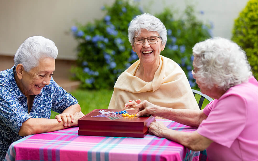 Ladies playing a board game