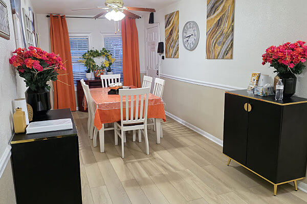 Bright and clean dining room with table and chairs for Brexhill Drive senior living residents